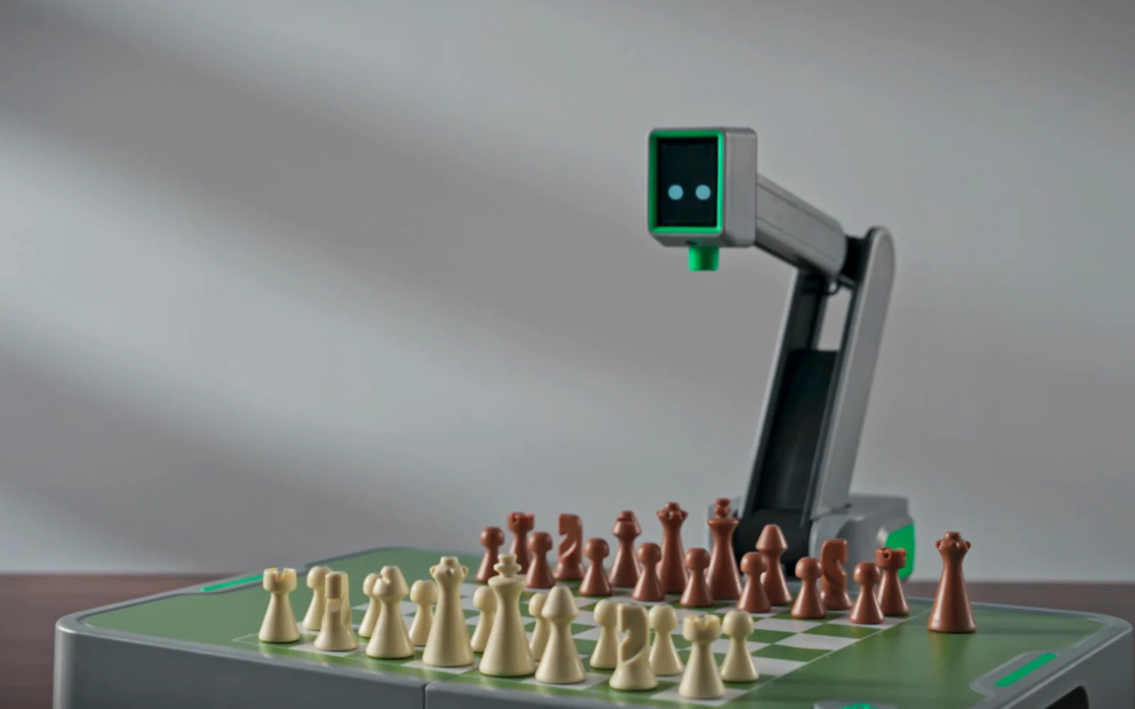 Cynus robotic arm above a physical chessboard with real pieces
